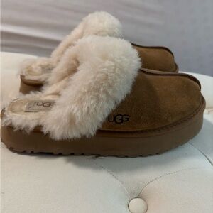 UGG slippers size 7.